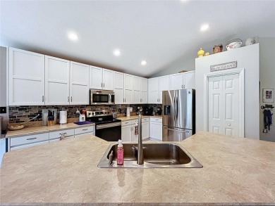 Welcome to this stunning 4-bedroom, 2-bathroom home boasting 2 on The Links of Lake Bernadette in Florida - for sale on GolfHomes.com, golf home, golf lot