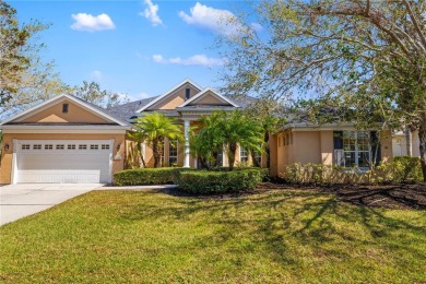 Discover this stunning 4-bedroom, 3-bathroom Neal Built home on University Park Country Club in Florida - for sale on GolfHomes.com, golf home, golf lot