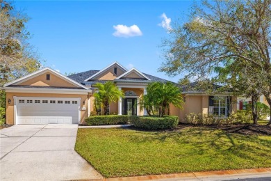 Discover this stunning 4-bedroom, 3-bathroom Neal Built home on University Park Country Club in Florida - for sale on GolfHomes.com, golf home, golf lot