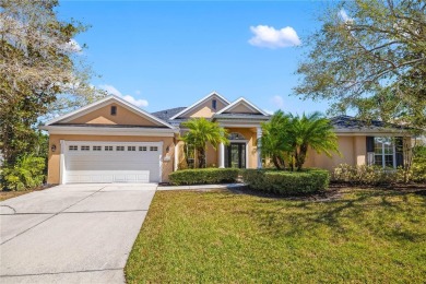 Discover this stunning 4-bedroom, 3-bathroom Neal Built home on University Park Country Club in Florida - for sale on GolfHomes.com, golf home, golf lot