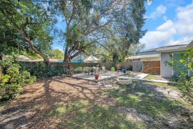 Property is located in a golf cartable neighborhood across the on The Dunedin Country Club in Florida - for sale on GolfHomes.com, golf home, golf lot