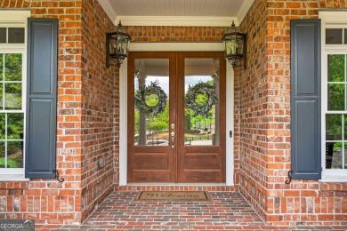 This stunning executive home sits on 2 acres in the Creekview on Woodmont Golf and Country Club in Georgia - for sale on GolfHomes.com, golf home, golf lot