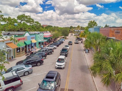 Property is located in a golf cartable neighborhood across the on The Dunedin Country Club in Florida - for sale on GolfHomes.com, golf home, golf lot