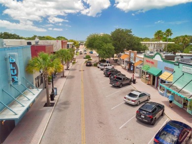 Property is located in a golf cartable neighborhood across the on The Dunedin Country Club in Florida - for sale on GolfHomes.com, golf home, golf lot