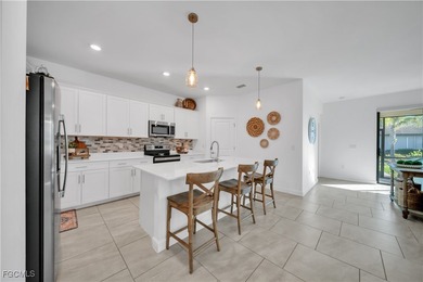 Welcome to luxurious living in the prestigious gated and guarded on Old Corkscrew Golf Club in Florida - for sale on GolfHomes.com, golf home, golf lot