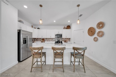 Welcome to luxurious living in the prestigious gated and guarded on Old Corkscrew Golf Club in Florida - for sale on GolfHomes.com, golf home, golf lot