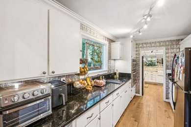 509 W 2nd has it all. Beautiful main home, detached cottage with on Miler Country Club in South Carolina - for sale on GolfHomes.com, golf home, golf lot