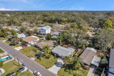 Property is located in a golf cartable neighborhood across the on The Dunedin Country Club in Florida - for sale on GolfHomes.com, golf home, golf lot