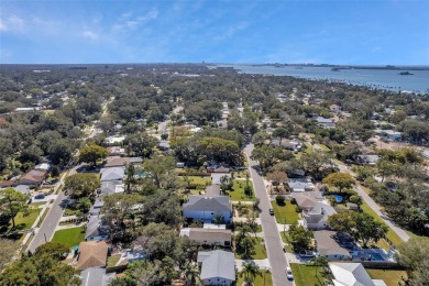 Property is located in a golf cartable neighborhood across the on The Dunedin Country Club in Florida - for sale on GolfHomes.com, golf home, golf lot