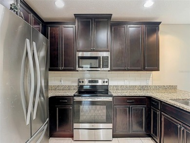 **See the FULL LENGTH VIDEO on Tour Link 1.** LOCATION, LOCATION on Stonegate Golf Club in Florida - for sale on GolfHomes.com, golf home, golf lot