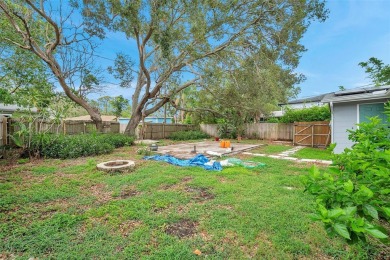 Property is located in a golf cartable neighborhood across the on The Dunedin Country Club in Florida - for sale on GolfHomes.com, golf home, golf lot