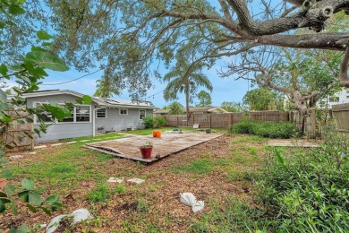 Property is located in a golf cartable neighborhood across the on The Dunedin Country Club in Florida - for sale on GolfHomes.com, golf home, golf lot