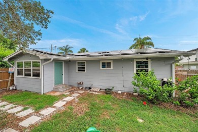 Property is located in a golf cartable neighborhood across the on The Dunedin Country Club in Florida - for sale on GolfHomes.com, golf home, golf lot