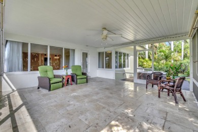 Upon entry, The WOW factor is immediate!  This is a home you on Lake Worth Municipal Golf Course in Florida - for sale on GolfHomes.com, golf home, golf lot