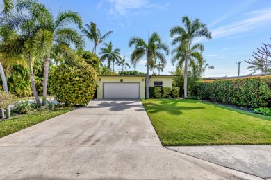 Upon entry, The WOW factor is immediate!  This is a home you on Lake Worth Municipal Golf Course in Florida - for sale on GolfHomes.com, golf home, golf lot