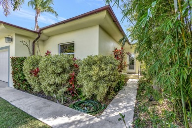 Upon entry, The WOW factor is immediate!  This is a home you on Lake Worth Municipal Golf Course in Florida - for sale on GolfHomes.com, golf home, golf lot