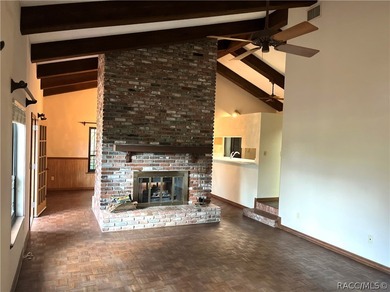 Discover a one-of-a-kind retreat with this spectacular custom on Citrus Springs Country Club in Florida - for sale on GolfHomes.com, golf home, golf lot