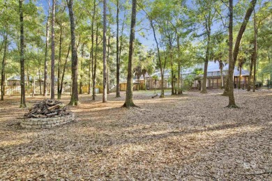 This beautiful home sits on a shaded lot (1.36 acre) in the on Rock Creek Golf Club in Alabama - for sale on GolfHomes.com, golf home, golf lot