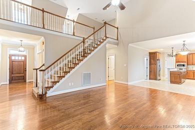 Gates Four - Welcome to this stunning 5-bedroom, 3.5-bath brick on Gates Four Golf and Country Club in North Carolina - for sale on GolfHomes.com, golf home, golf lot