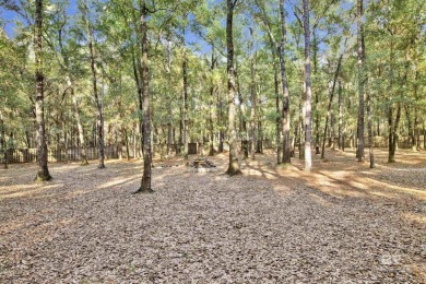 This beautiful home sits on a shaded lot (1.36 acre) in the on Rock Creek Golf Club in Alabama - for sale on GolfHomes.com, golf home, golf lot