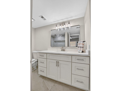 Completely remodeled and fully permitted, this secluded on Boca Dunes Golf and Country Club in Florida - for sale on GolfHomes.com, golf home, golf lot