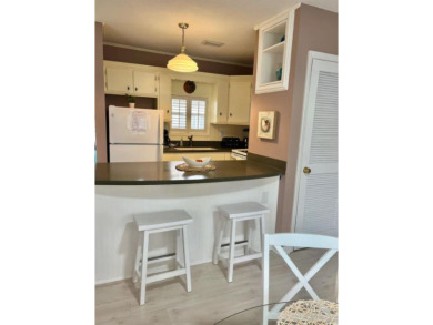 Welcome to your coastal retreat, located in the premier, gated on Tupelo Bay Golf Complex  in South Carolina - for sale on GolfHomes.com, golf home, golf lot