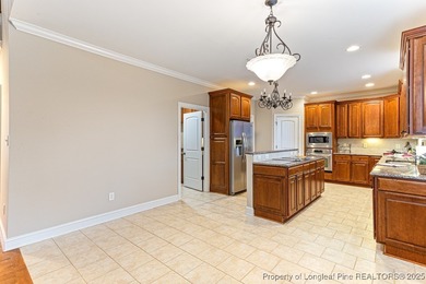 Gates Four - Welcome to this stunning 5-bedroom, 3.5-bath brick on Gates Four Golf and Country Club in North Carolina - for sale on GolfHomes.com, golf home, golf lot