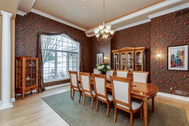 Situated along Hawk's Landing's premier fairway, this custom on Hawks Landing Golf Club in Wisconsin - for sale on GolfHomes.com, golf home, golf lot