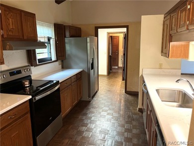 Discover a one-of-a-kind retreat with this spectacular custom on Citrus Springs Country Club in Florida - for sale on GolfHomes.com, golf home, golf lot