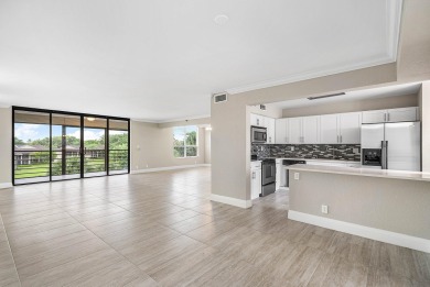Discover this stunning condo with breathtaking lake and golf on Boca Pointe Country Club in Florida - for sale on GolfHomes.com, golf home, golf lot