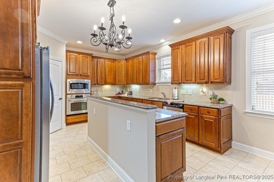 Gates Four - Welcome to this stunning 5-bedroom, 3.5-bath brick on Gates Four Golf and Country Club in North Carolina - for sale on GolfHomes.com, golf home, golf lot