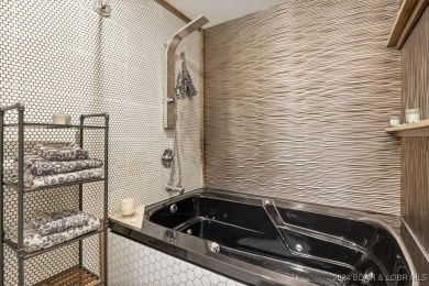Amazing Top Floor End Unit 3 bed / 2.5 bath Condo boasting over on Seasons Ridge At Four Seasons in Missouri - for sale on GolfHomes.com, golf home, golf lot