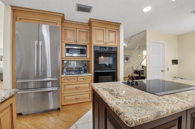 HOUSE IS PRICED TO SELL.  Fabulous 1-story pool home with 2-car on Boca Greens Country Club in Florida - for sale on GolfHomes.com, golf home, golf lot