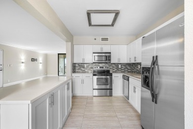 Discover this stunning condo with breathtaking lake and golf on Boca Pointe Country Club in Florida - for sale on GolfHomes.com, golf home, golf lot