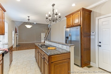 Gates Four - Welcome to this stunning 5-bedroom, 3.5-bath brick on Gates Four Golf and Country Club in North Carolina - for sale on GolfHomes.com, golf home, golf lot