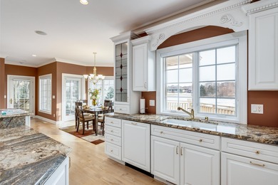 Situated along the premier fairway of Hawks Landing golf course on Hawks Landing Golf Club in Wisconsin - for sale on GolfHomes.com, golf home, golf lot