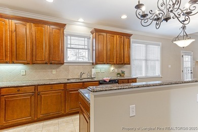 Gates Four - Welcome to this stunning 5-bedroom, 3.5-bath brick on Gates Four Golf and Country Club in North Carolina - for sale on GolfHomes.com, golf home, golf lot