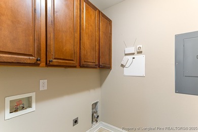 Gates Four - Welcome to this stunning 5-bedroom, 3.5-bath brick on Gates Four Golf and Country Club in North Carolina - for sale on GolfHomes.com, golf home, golf lot