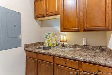 Gates Four - Welcome to this stunning 5-bedroom, 3.5-bath brick on Gates Four Golf and Country Club in North Carolina - for sale on GolfHomes.com, golf home, golf lot