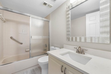 Discover this stunning condo with breathtaking lake and golf on Boca Pointe Country Club in Florida - for sale on GolfHomes.com, golf home, golf lot