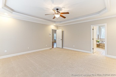 Gates Four - Welcome to this stunning 5-bedroom, 3.5-bath brick on Gates Four Golf and Country Club in North Carolina - for sale on GolfHomes.com, golf home, golf lot