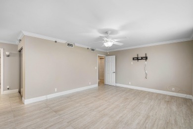 Discover this stunning condo with breathtaking lake and golf on Boca Pointe Country Club in Florida - for sale on GolfHomes.com, golf home, golf lot
