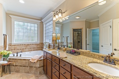 Gates Four - Welcome to this stunning 5-bedroom, 3.5-bath brick on Gates Four Golf and Country Club in North Carolina - for sale on GolfHomes.com, golf home, golf lot