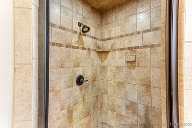 Gates Four - Welcome to this stunning 5-bedroom, 3.5-bath brick on Gates Four Golf and Country Club in North Carolina - for sale on GolfHomes.com, golf home, golf lot