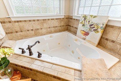 Gates Four - Welcome to this stunning 5-bedroom, 3.5-bath brick on Gates Four Golf and Country Club in North Carolina - for sale on GolfHomes.com, golf home, golf lot