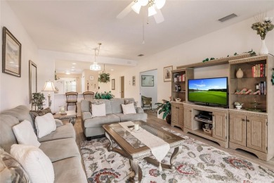 NEW FLOORS IN LIVING AREA! Picture yourself living in a serene on The Preserve Golf Club At Tara in Florida - for sale on GolfHomes.com, golf home, golf lot