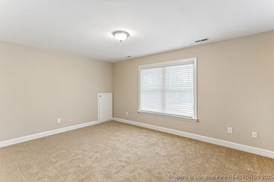 Gates Four - Welcome to this stunning 5-bedroom, 3.5-bath brick on Gates Four Golf and Country Club in North Carolina - for sale on GolfHomes.com, golf home, golf lot