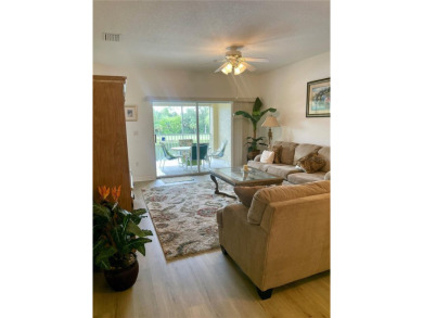 NEW FLOORS IN LIVING AREA! Picture yourself living in a serene on The Preserve Golf Club At Tara in Florida - for sale on GolfHomes.com, golf home, golf lot