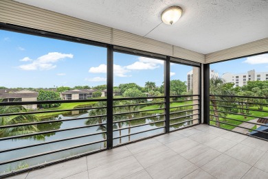 Discover this stunning condo with breathtaking lake and golf on Boca Pointe Country Club in Florida - for sale on GolfHomes.com, golf home, golf lot