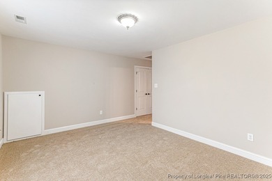 Gates Four - Welcome to this stunning 5-bedroom, 3.5-bath brick on Gates Four Golf and Country Club in North Carolina - for sale on GolfHomes.com, golf home, golf lot